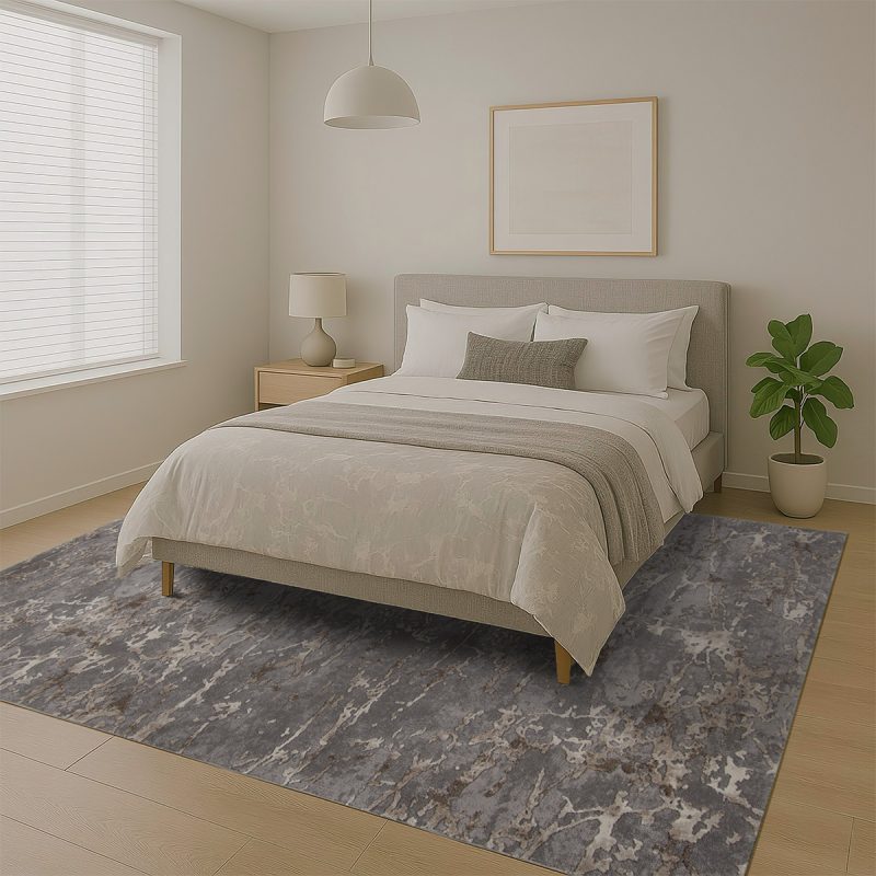 a bed with a plant on the floor