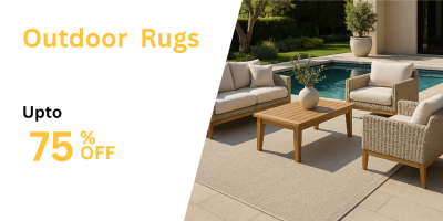 a couch and a table by a pool